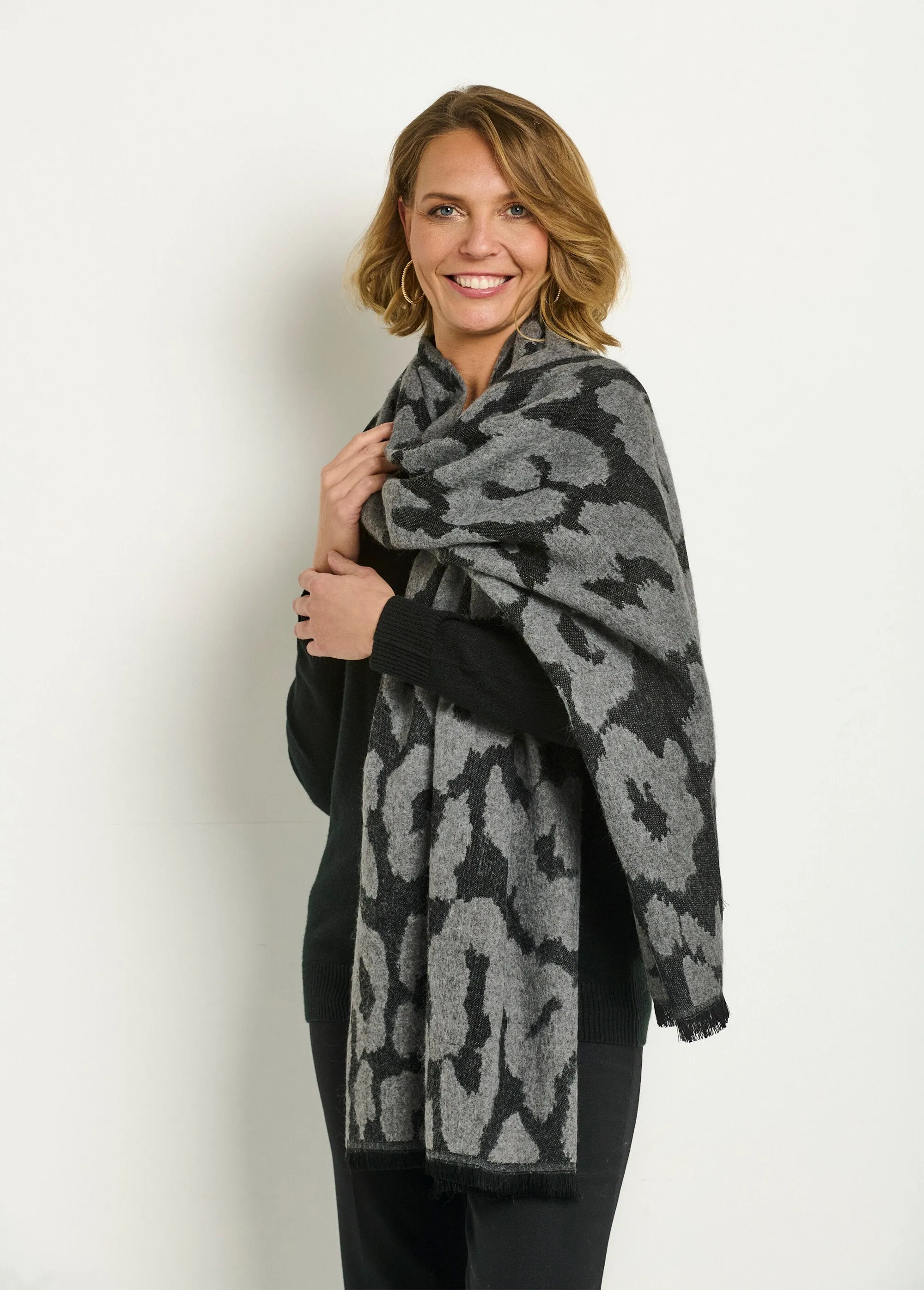 Large warm scarf with stylish leopard pattern