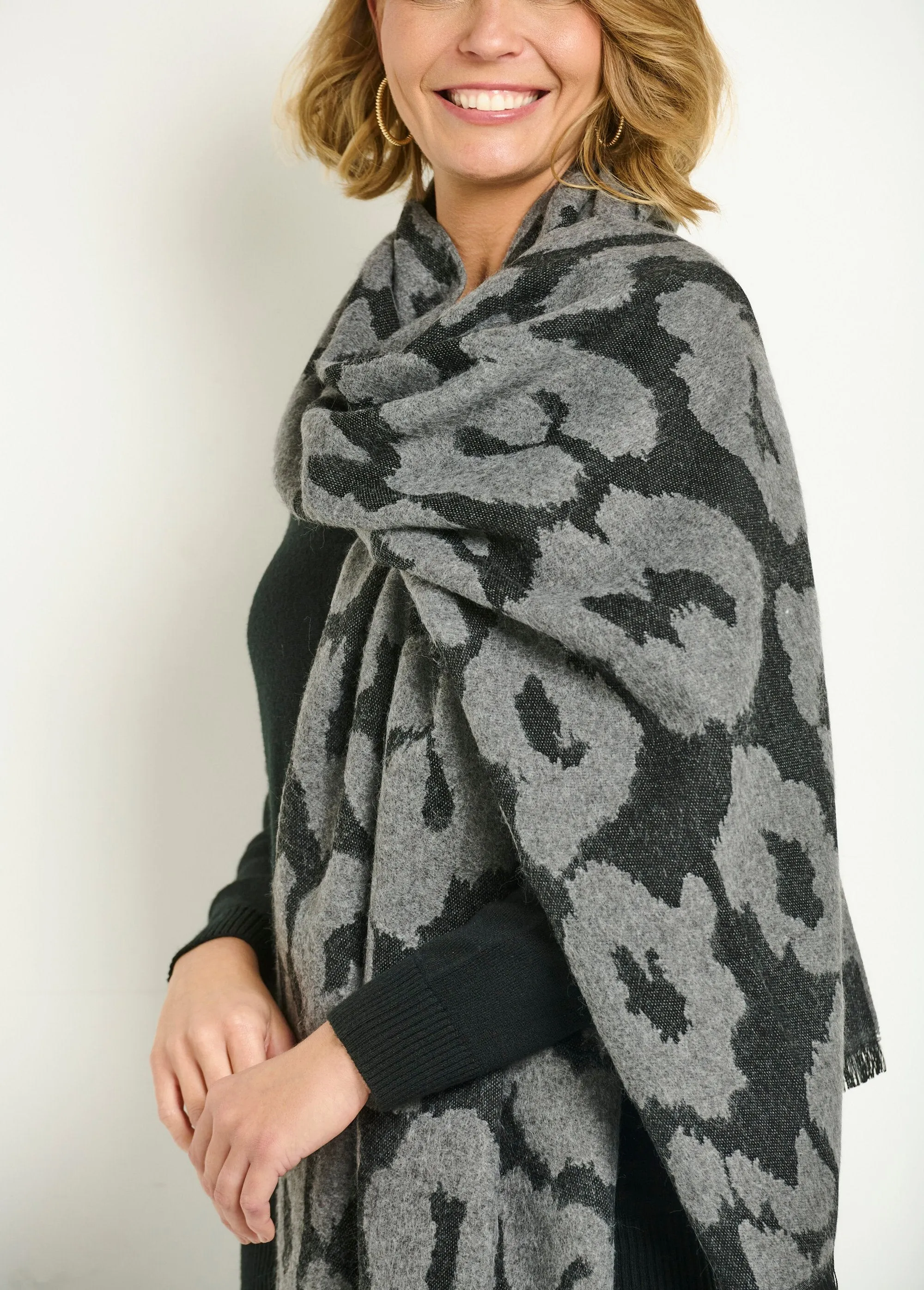 Large warm scarf with stylish leopard pattern