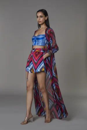 Saaksha & KinniÂ    I   Light blue / blue stripe bustier  Pink blue big diamond shorts Cape - Chiffon / Organza  Bustier - Satin  Shorts - Satin Cape - Pink / blue  Bustier - Blue  Shorts - Pink / blue SS22051    SS22052    SS22053